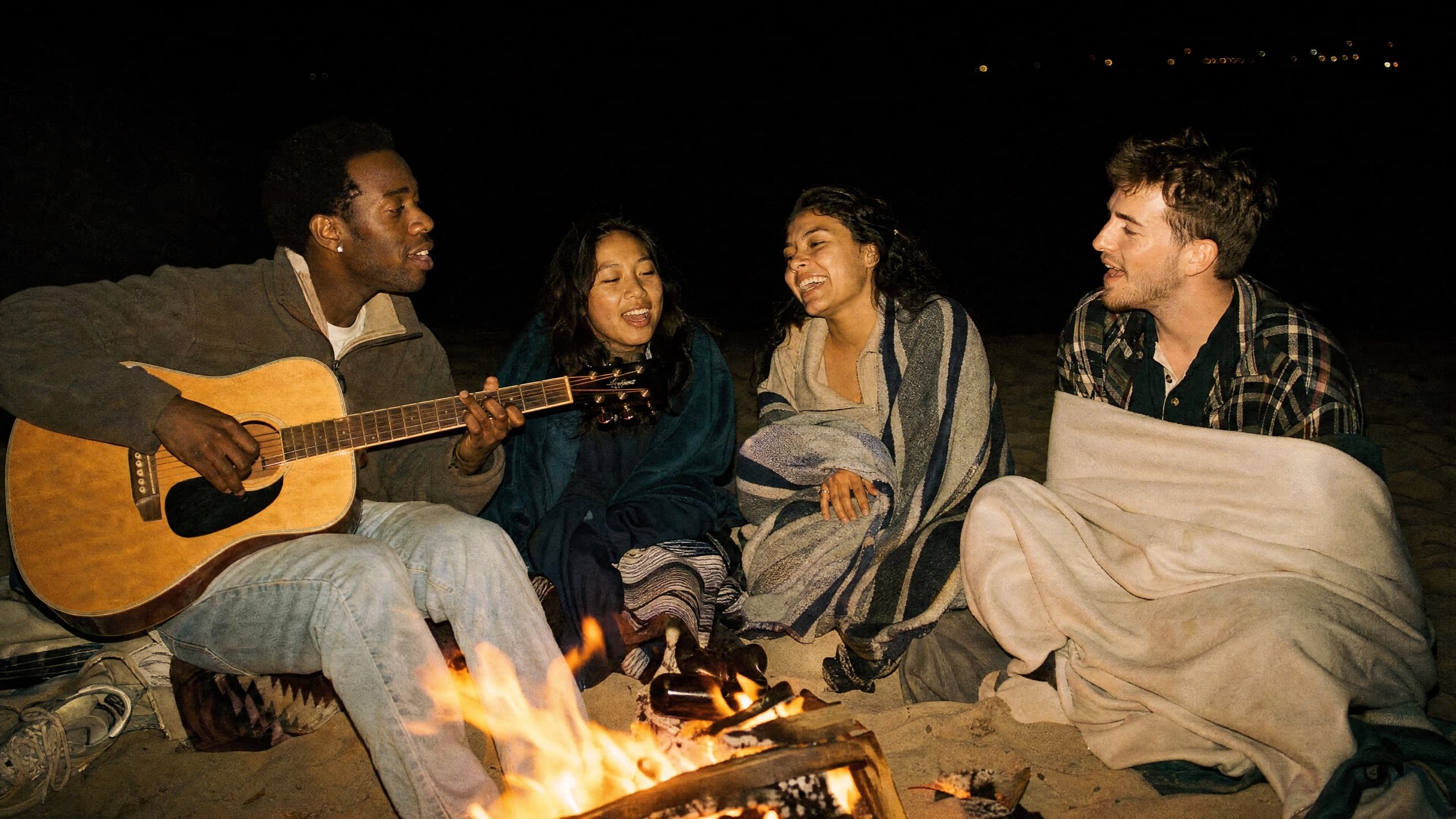 Friends around a bonfire
